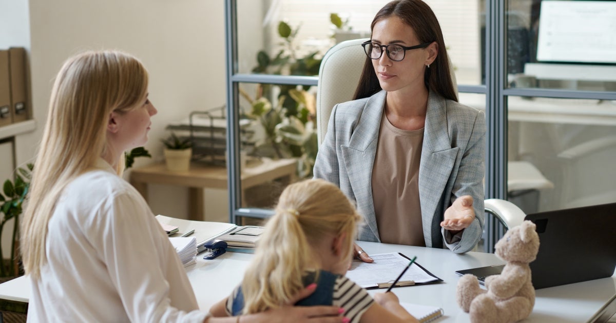 licensed social worker with mother and child