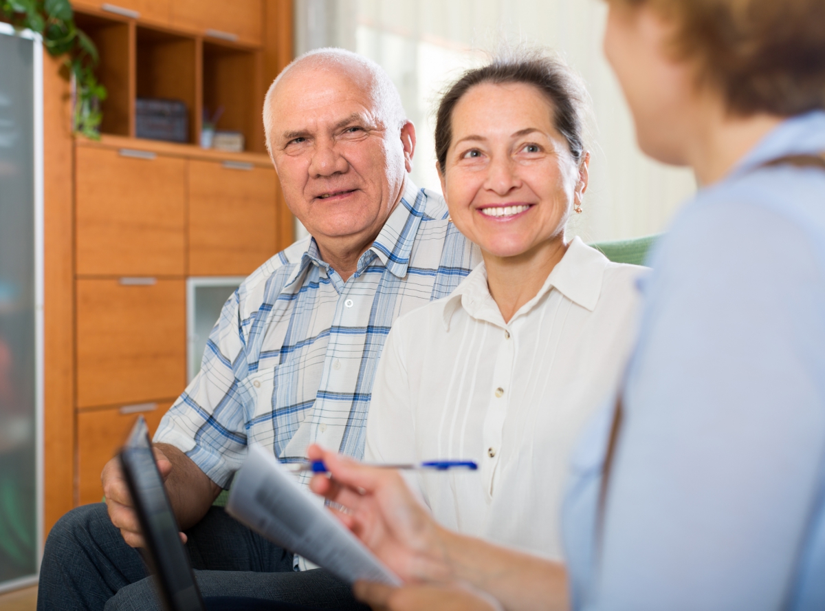 social worker with elderly couple