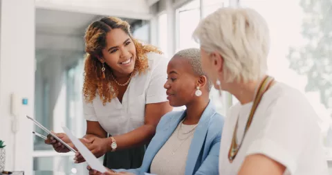 licensed social worker with two women